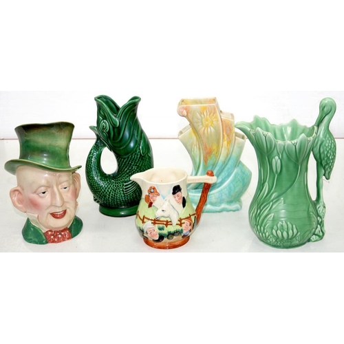 126 - A BESWICK MICAWBER CHARACTER JUG AND FOUR VARIOUS SYLVAC AND OTHER DECORATIVE JUGS 