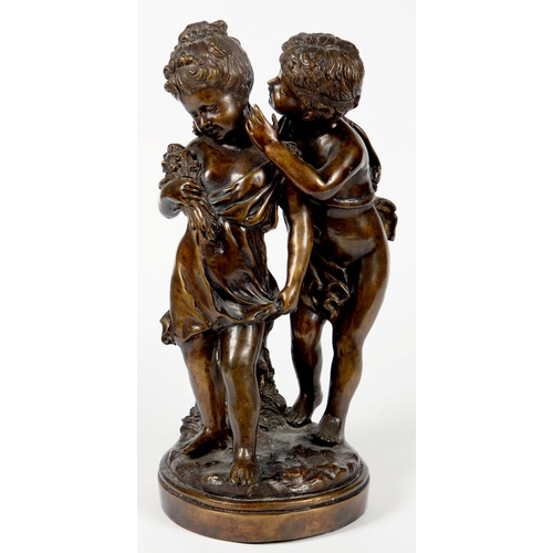 229 - A BRONZED SCULPTURE OF TWO CHILDREN, 45CM H