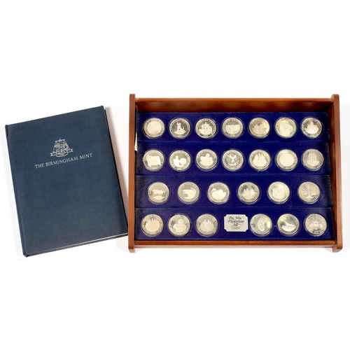 257 - THE NEW ELIZABETHAN AGE. A SET OF 26 PROOF SILVER COMMEMORATIVE MEDALS, 1977, IN STEPPED DISPLAY CAS... 