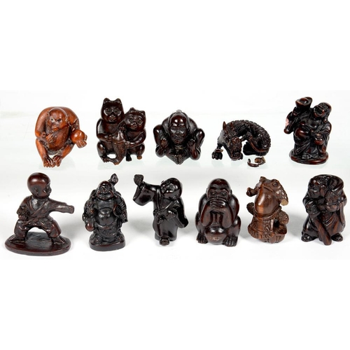 286 - ELEVEN JAPANESE CARVED WOOD NETSUKE, VARIOUS SIZES, 20TH C