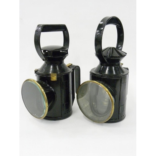 375 - RAILWAYANA. AN L.N.E.R. LOCO BLACK PAINTED HAND LANTERN AND A B.R. BLACK PAINTED HAND LANTERN, 31CM ... 