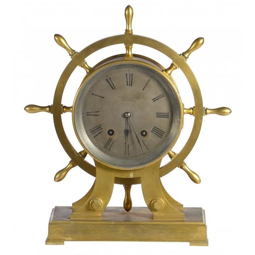 388 - A VICTORIAN GILT BRASS SHIP'S WHEEL MANTEL CLOCK, C1870, the silvered dial engraved BARRAUD & LUNDS ... 