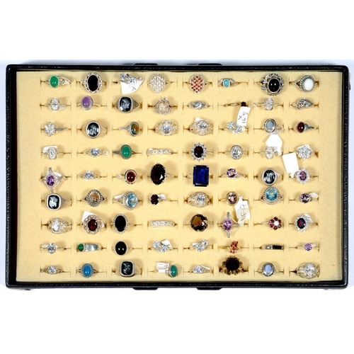 64 - SEVENTY TWO SILVER RINGS SET WITH SYNTHETIC STONES