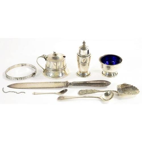 101 - A GEORGE VI SILVER THREE PIECE CONDIMENT SET, BLUE GLASS LINERS, PEPPER CASTER 7CM H, BIRMINGHAM 194... 