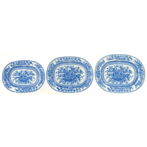 131 - A GRADUATED SET OF THREE ENGLISH BLUE PRINTED EARTHENWARE DISHES, WITH BASKET OF FLOWERS PRINT, 28-3... 