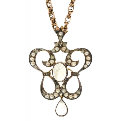 16 - A MOONSTONE, SPLIT PEARL AND DIAMOND OPENWORK PENDANT IN GOLD, EARLY 20TH C, ON A GOLD NECKLACE, 8.5... 