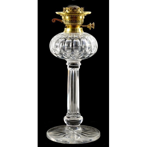 211 - AN EDWARD VII CUT GLASS OIL LAMP ON SUBSTANTIAL STAR CUT FOOT, WITH BRASS DUPLEX BURNER