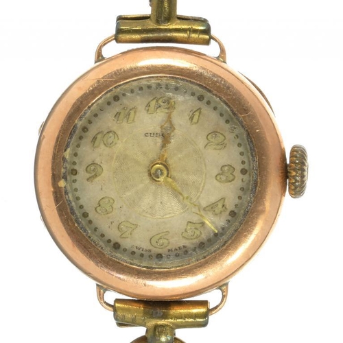 33B - A 9CT GOLD LADY'S WRISTWATCH, DIAL AND MOVEMENT MARKED 