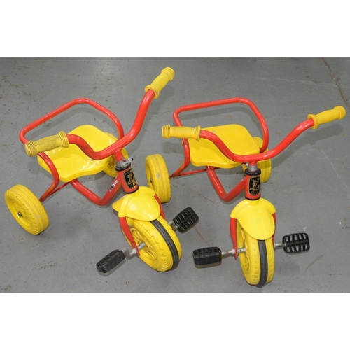 460 - TWO LEW-WAYS LIMITED RED PAINTED STEEL AND YELLOW TUBULAR PLASTIC CHILD'S TRICYCLES, C1980