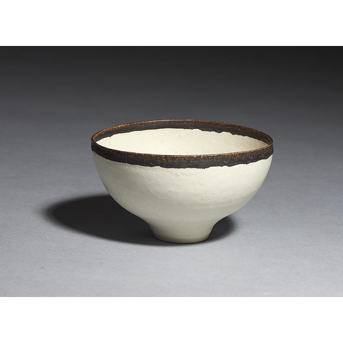 567 - DAME LUCIE RIE, DBE (1902-1995) PORCELAIN BOWL, C1960-65  ovoid on foot in white glaze with manganes... 