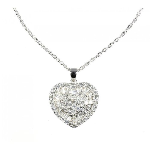 61 - A DIAMOND HEART SHAPED PENDANT  in white gold, 23mm overall, marked 750,  on white gold necklet, 5.3... 