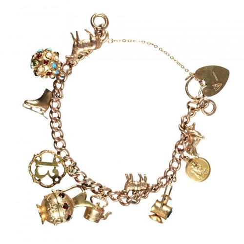 71 - A GOLD CHARM BRACELET 35g