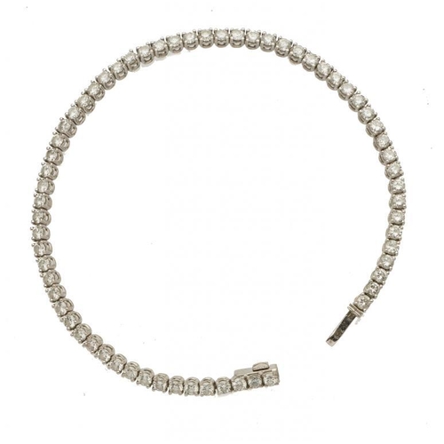 74 - A DIAMOND LINE BRACELET  in white gold, 177mm, 8,4g