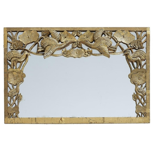 865 - A GILTWOOD OVERMANTLE MIRROR, EARLY 20TH C  the unbevelled plate in rectangular frame with high reli... 