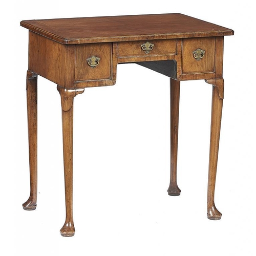 871 - A WALNUT AND FEATHERBANDED LOWBOY IN GEORGE II STYLE, EARLY 20TH C  with quarter veneered top and fi... 