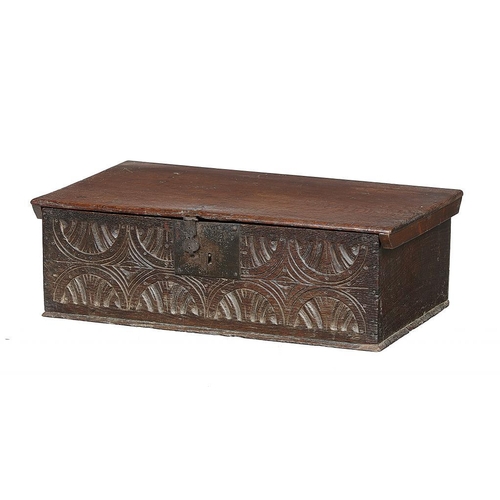 875 - A CHARLES II BOARDED OAK BOX, LATE 17TH C  with double lunette carved front, 22cm h; 41 x 71cm... 