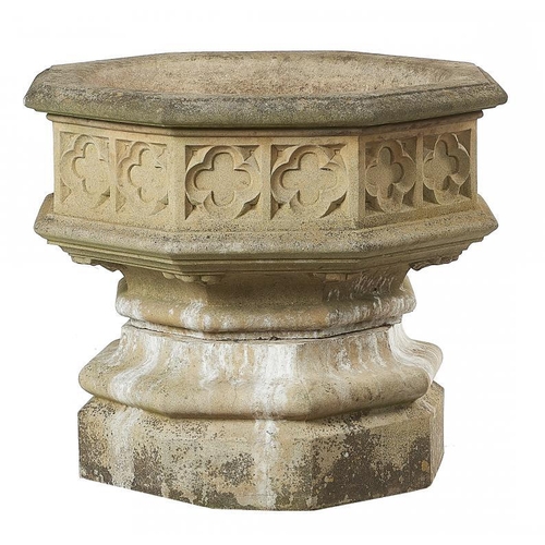 883 - A RECONSTITUTED STONE GARDEN VASE, 20TH C  in the form of a font, 70cm h, 89cm w