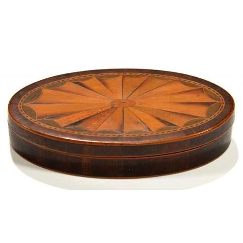 555 - TREEN.  A GEORGE III OVAL MAHOGANY AND INLAID SNUFF  BOX AND  COVER, C1800  the underside inlaid wit... 