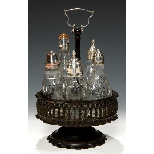 564 - A GEORGE III TURNED LIGNUM VITAE ROTATING CRUET WITH SILVER HANDLE, C1800  and a set of five contemp... 