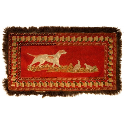 608 - A VICTORIAN PICTORIAL RED GROUND WOOLWORK RUG OF A DOG AND PARTRIDGES, MID 19TH C  in ribbon border,... 