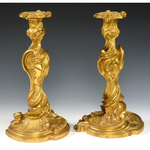 611 - A PAIR OF FRENCH ORMOLU CANDLESTICKS IN THE MANNER OF JUSTE -AURELE MEISSONNIER, 19TH C  nozzles, 30... 