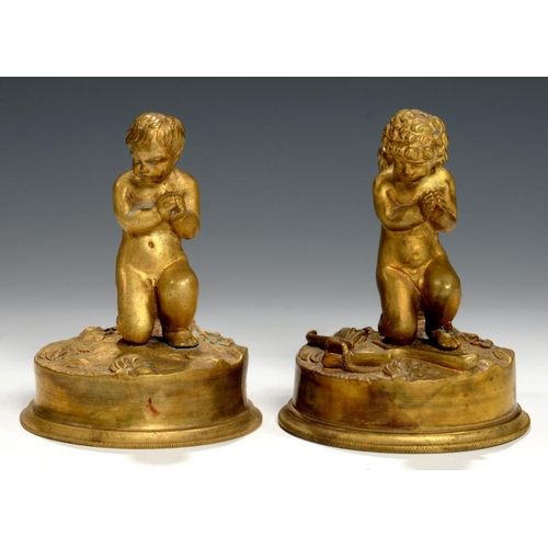 612 - TWO MINIATURE  FRENCH ORMOLU STATUETTES OF THE KNEELING PUTTO AND A CHILD, 19TH C 8cm h... 