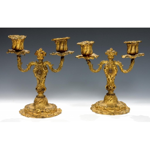 624 - A PAIR OF ROCOCO REVIVAL GILT BRASS CANDELABRA, MID 19TH C of two lights, nozzles, 21cm h... 