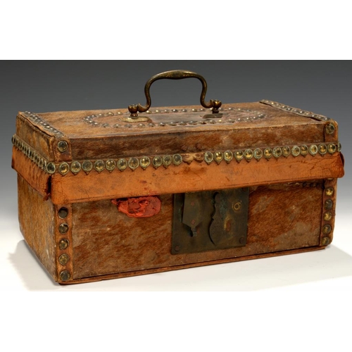 646 - AN ENGLISH BRASS NAILED LEATHER TRIMMED AND GOATSKIN COVERED CASKET, EARLY 19TH C  in the original s... 