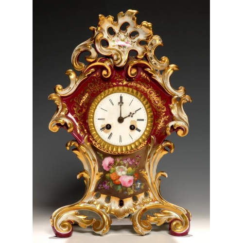 71 - A FRENCH CLARET GROUND PORCELAIN MANTLE CLOCK, C1840  painted with flowers the bell striking movemen... 