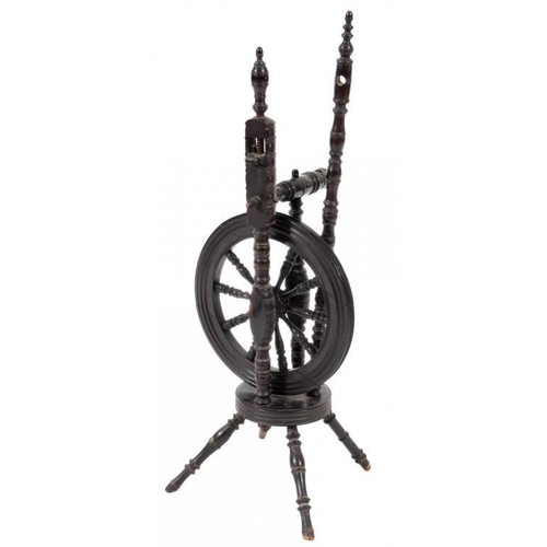 776 - A TURNED AND EBONISED WOOD UPRIGHT SPINNING WHEEL, 19TH C  wheel diameter 37cm,