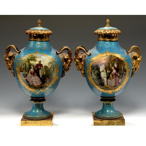 78 - A PAIR OF FRENCH ORMOLU MOUNTED SEVRES STYLE PORCELAIN VASES AND COVERS, C1860  painted in the manne... 