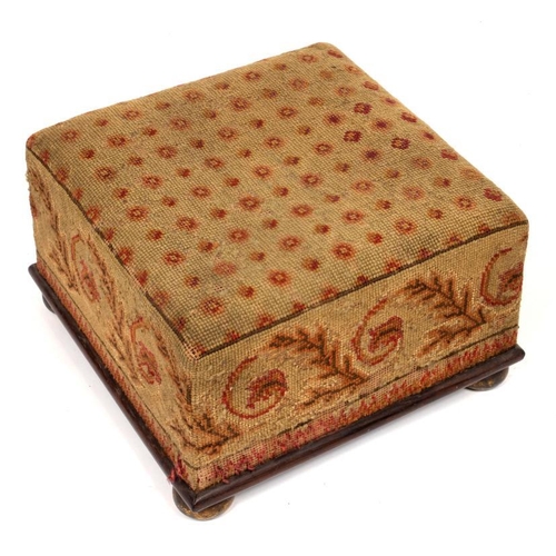 780 - A VICTORIAN WOOLWORK COVERED FOOTSTOOL, MID 19TH C  on rosewood base and brass bun feet, 22cm h; 35 ... 