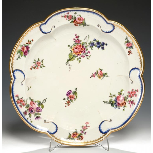 83 - A S�VRES  FEUILLE DE CHOUX LOBED DISH, 1793  painted with scattered bouquets, 30cm diam, blue   inte... 