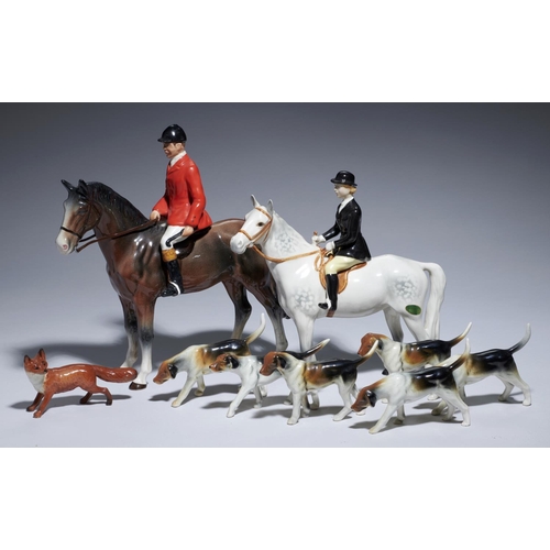 218 - A BESWICK FOX HUNTER (LADY) AND A SIMILAR FIGURE (MAN) AND SIX HOUNDS, MAN 25CM H, PRINTED MARK OR U... 