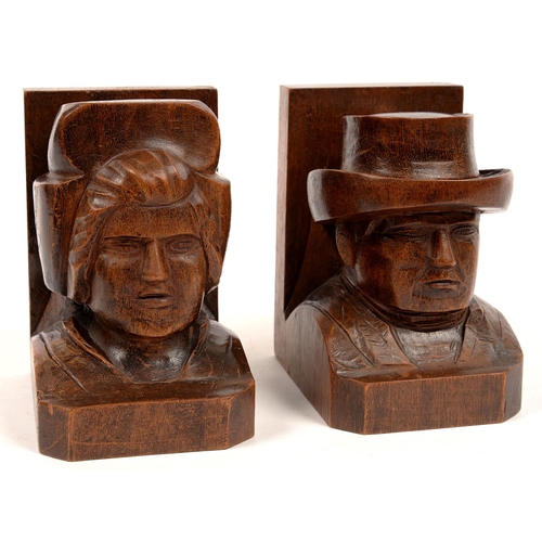 338 - A PAIR OF CARVED AND STAINED WOOD BOOKENDS IN THE FORM OF THE HEAD OF A MAN OR WOMAN, 14CM H, PROBAB... 