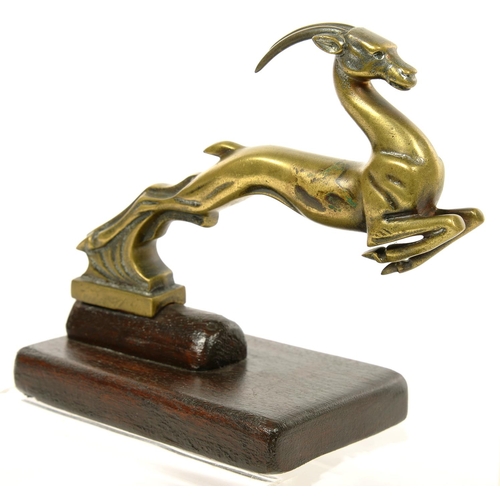 276 - AN ART DECO BRONZE LEAPING GAZELLE MASCOT ON WOOD STAND, 13CM H