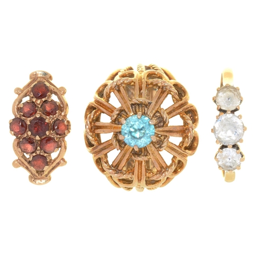 75 - A GARNET CLUSTER RING IN 9CT GOLD, A ZIRCON RING IN 9CT GOLD AND ANOTHER GEM SET RING IN 9CT GOLD, 1... 