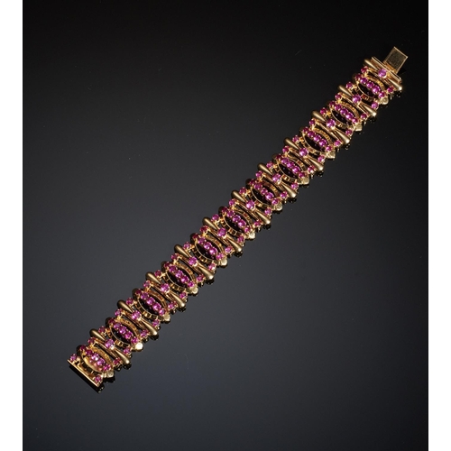 76 - A GOLD AND SYNTHETIC RUBY BRACELET, 18.5CM L, MARKED 750, 51.5G