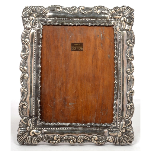 122 - A PERUVIAN SILVER MOUNTED WOODEN PHOTOGRAPH FRAME, 32 X 26 CM, MARKED 925