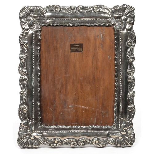 122 - A PERUVIAN SILVER MOUNTED WOODEN PHOTOGRAPH FRAME, 32 X 26 CM, MARKED 925