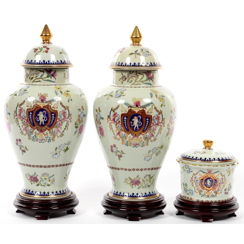 165 - ONE AND A PAIR OF CHINESE  REPRODUCTION ARMORIAL JARS AND COVERS, LARGEST 35CM H, WITH STANDS&n... 