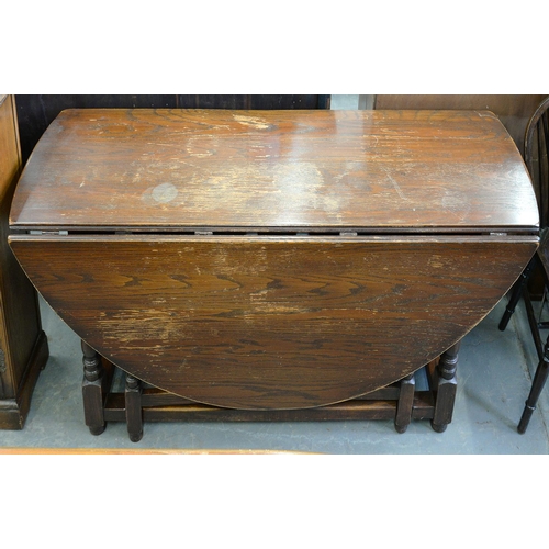 545 - AN OAK GATELEG TABLE, 76CM H X 168CM L