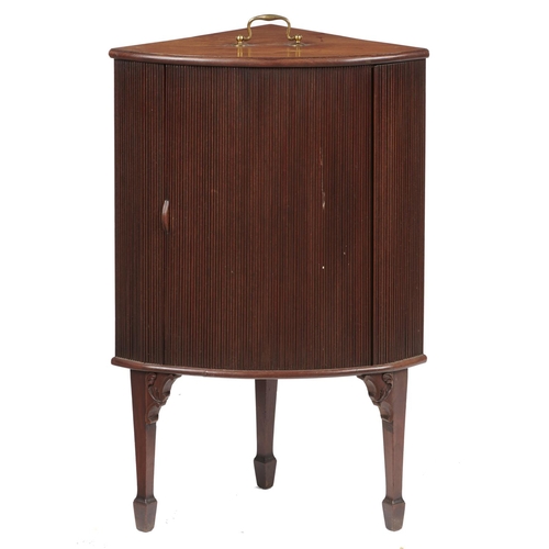 570 - A GEORGE III BOW FRONTED MAHOGANY CORNER CUPBOARD, C1800, WITH BRASS HANDLE TO THE TOP AND TAMBOUR S... 