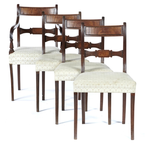 580 - A SET OF FOUR GEORGE IV MAHOGANY DINING CHAIRS, ON SABRE LEGS, INCLUDING AN ELBOW CHAIR