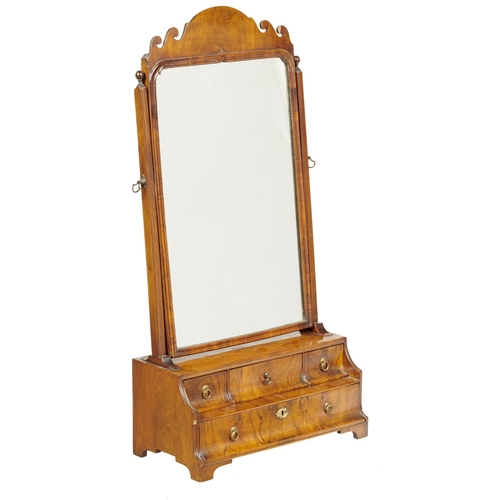 592 - A WALNUT DRESSING MIRROR, LATE 19TH C, WITH MOULDED FRAME ON STEPPED BASE FITTED WITH DRAWERS WITH B... 