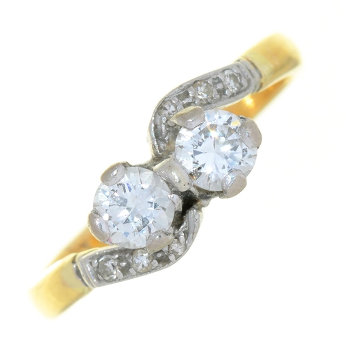 83c - A DIAMOND CROSSOVER RING IN GOLD, MARKED 18CT, 3G, SIZE L ½