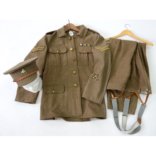 451 - MODERN REPRODUCTION BRITISH ARMY SERGE BATTLEDRESS AND TROUSERS OF A CORPORAL BY SOLDIER OF FORTUNE,... 