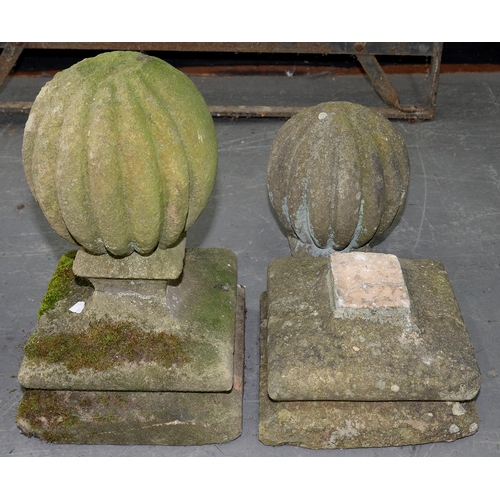 560 - TWO SANDSTONE LOBED GLOBULAR FINIALS, 43CM H; 24 X 24CM, PROBABLY 19TH C