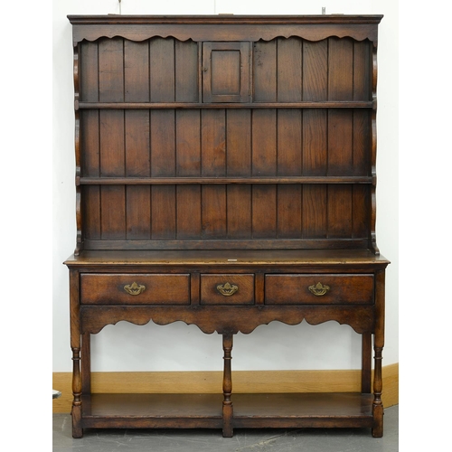 574 - AN ANTIQUE STYLE OAK DRESSER AND RACK, 180CM H; 138 X 43CM