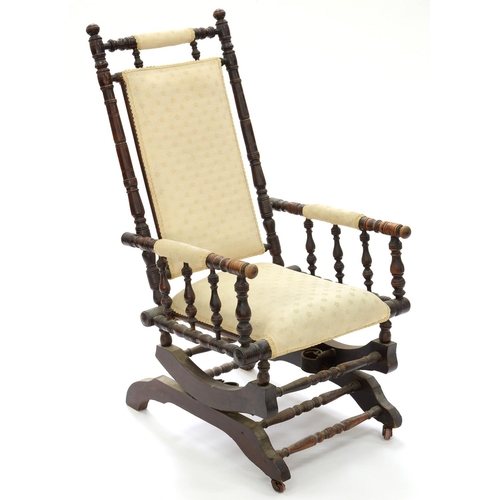 585 - A MAHOGANY AMERICAN ROCKING CHAIR, EARLY 20TH C